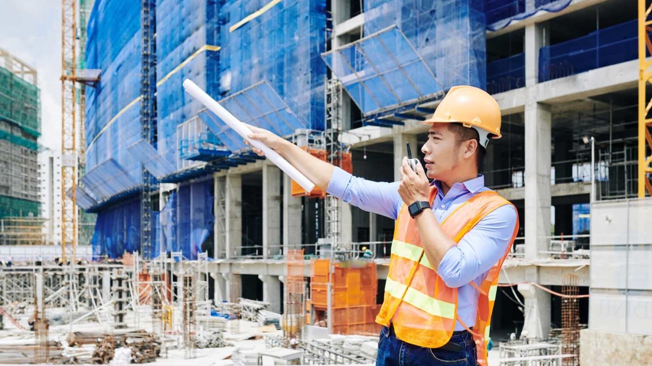 serious-civil-engineer-managing-construction-proce-ZPECTN7